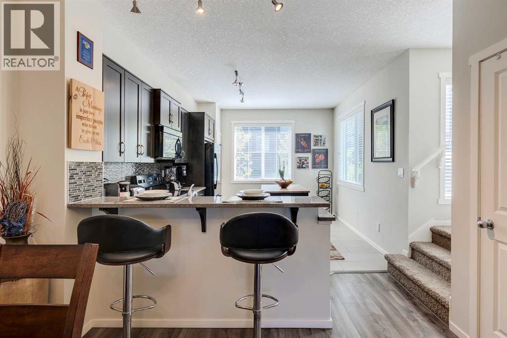 8 Kinlea Common Nw, Calgary, Alberta  T3K 3Z5 - Photo 6 - A2259897
