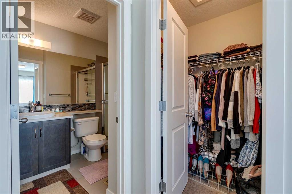 8 Kinlea Common Nw, Calgary, Alberta  T3K 3Z5 - Photo 21 - A2259897