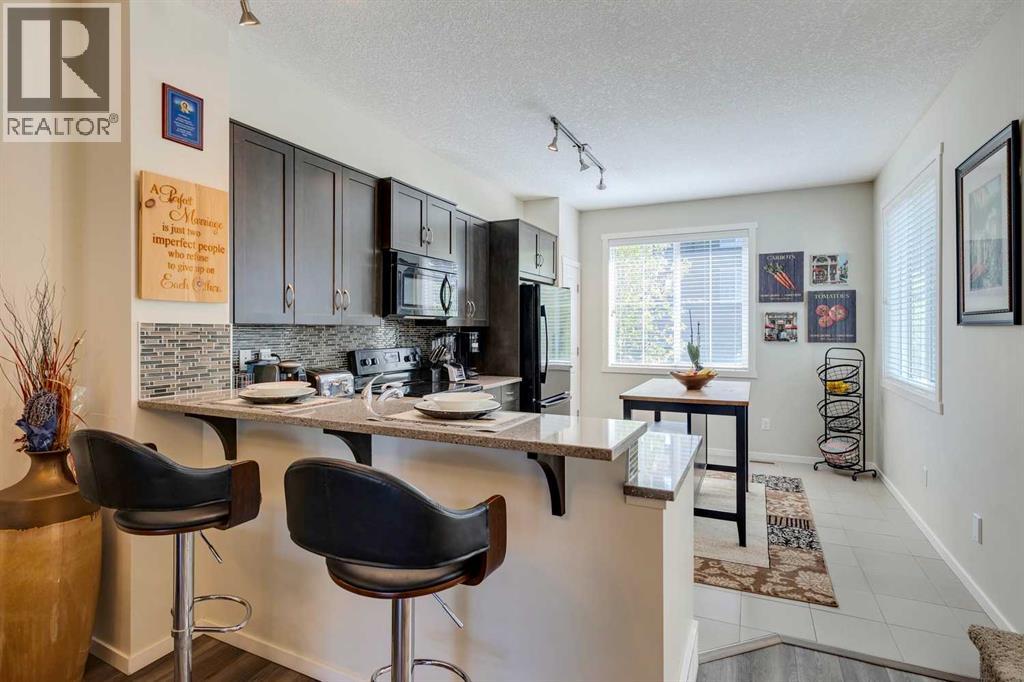 8 Kinlea Common Nw, Calgary, Alberta  T3K 3Z5 - Photo 5 - A2259897