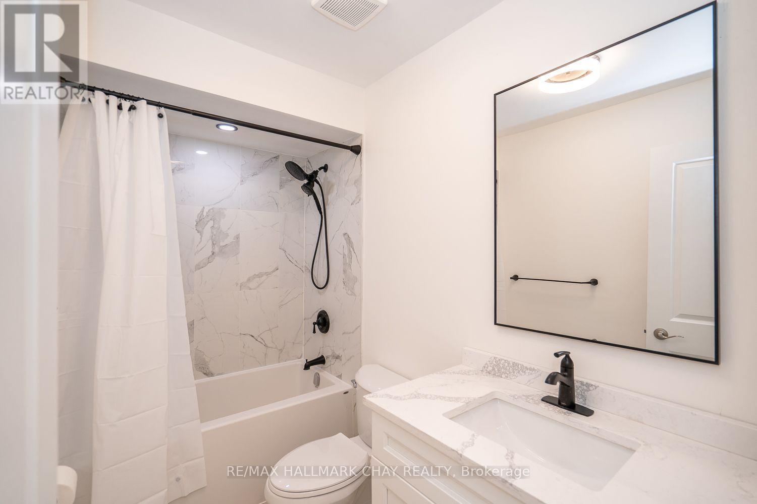95 Boyne Crescent, New Tecumseth, Ontario  L9R 1K2 - Photo 32 - N12425383
