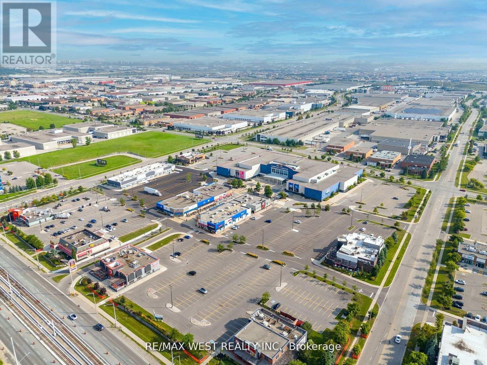 2 - 90 Courtneypark Drive E, Mississauga, Ontario  L5T 1S5 - Photo 7 - W12425654