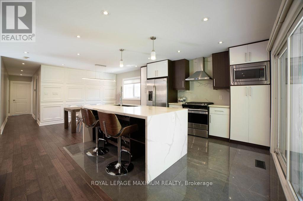 76 Langholm Drive, Toronto, Ontario  M3M 2R8 - Photo 9 - W12425690