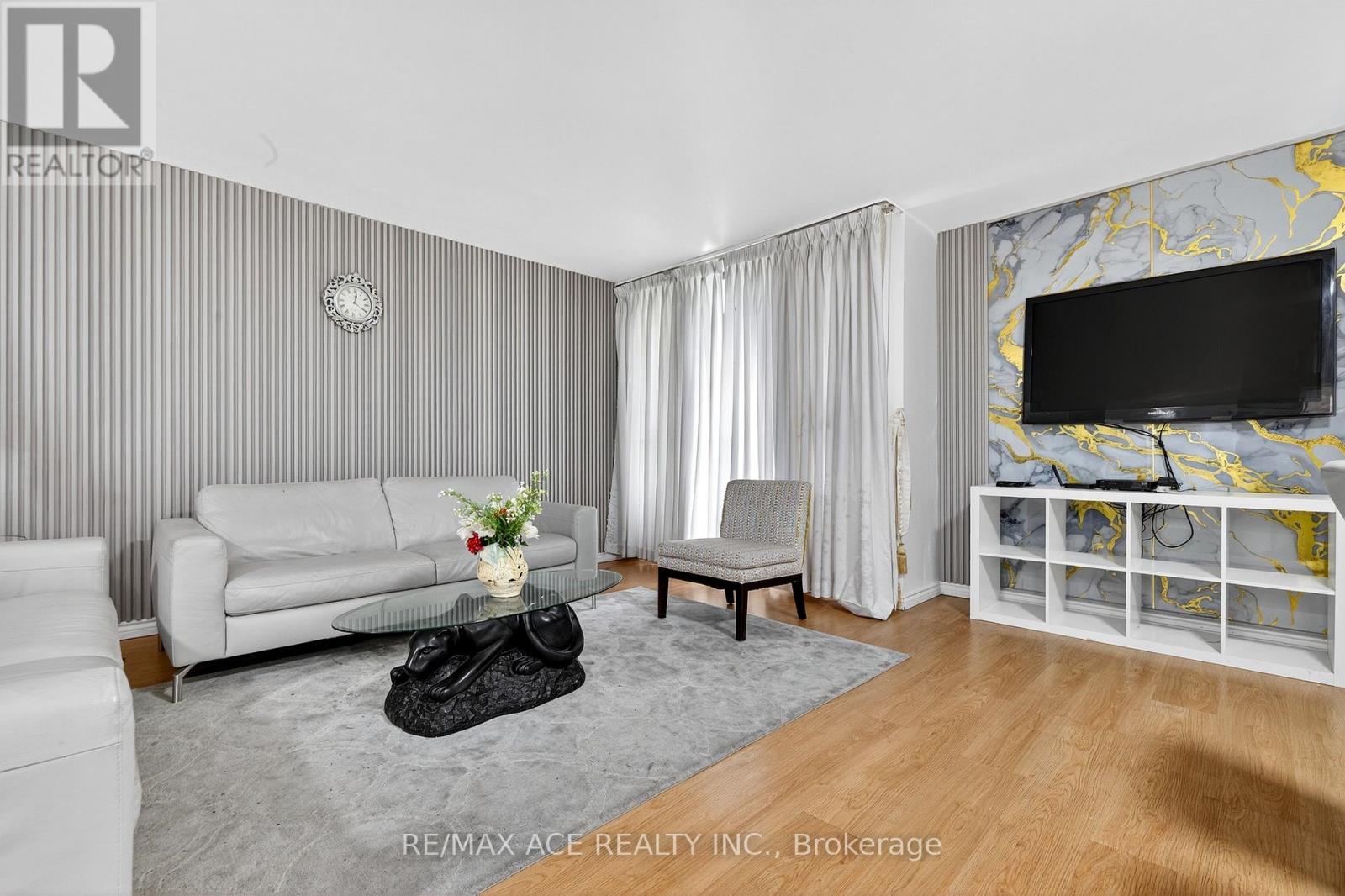 303 - 10 Crescent Town Road, Toronto, Ontario  M4C 5L3 - Photo 1 - E12424763