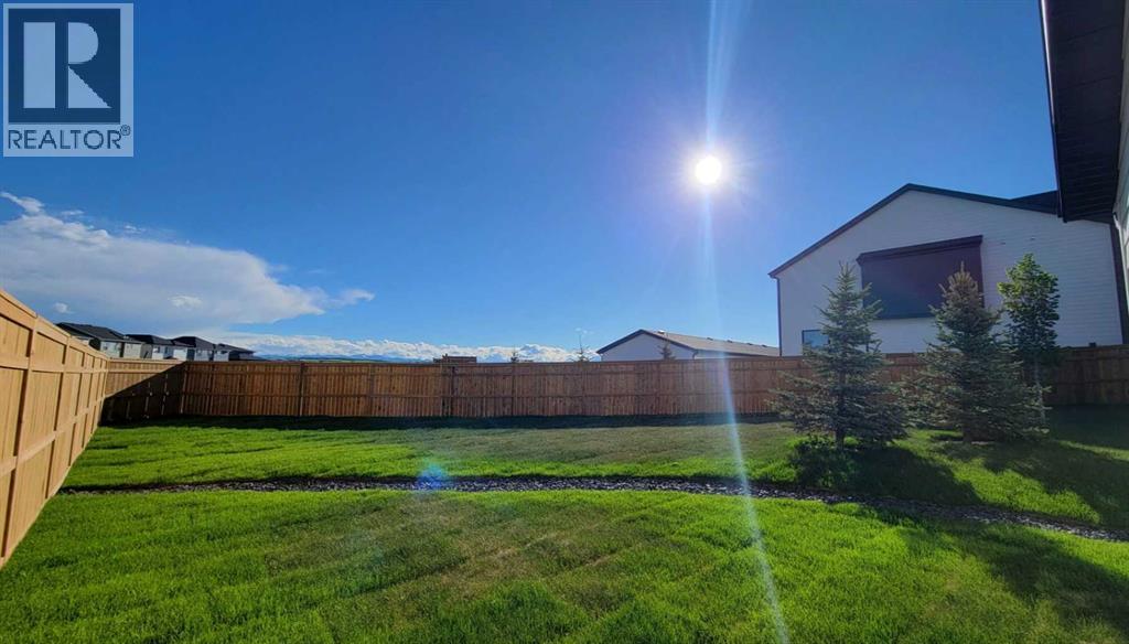 1125 Harmony Heath, Rural Rocky View County, Alberta  T3G 0J6 - Photo 2 - A2257418