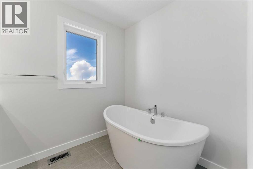 1125 Harmony Heath, Rural Rocky View County, Alberta  T3G 0J6 - Photo 25 - A2257418