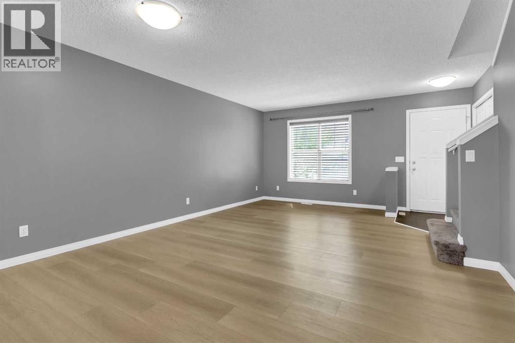 3194 New Brighton Gardens Se, Calgary, Alberta  T2Z 0Y1 - Photo 6 - A2259922