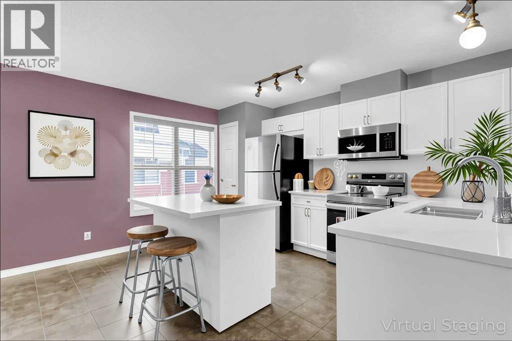3194 New Brighton Gardens Se, Calgary, Alberta  T2Z 0Y1 - Photo 9 - A2259922