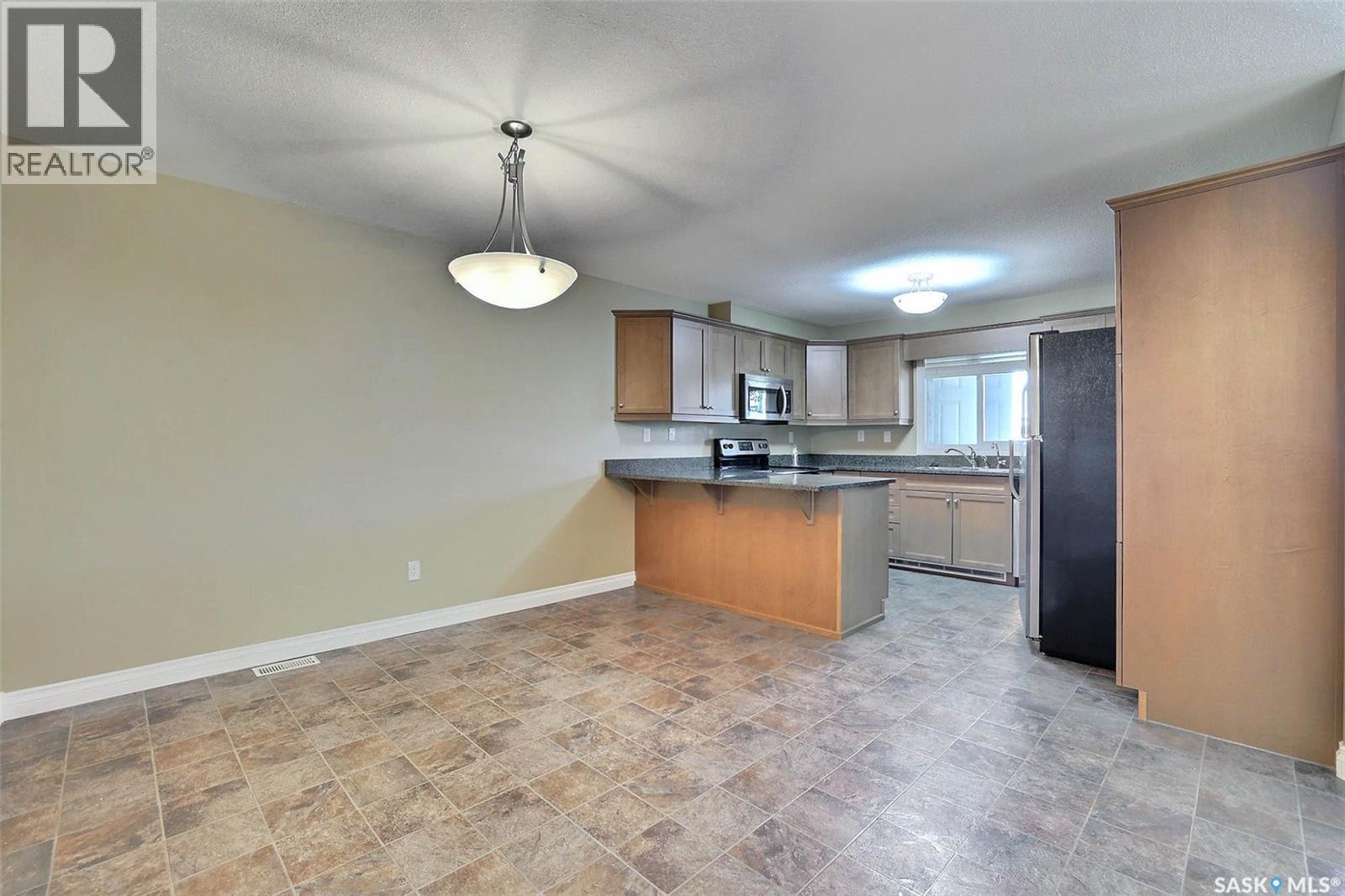 102 3850 Haughton Road E, Regina, Saskatchewan  S4V 1M7 - Photo 6 - SK019340