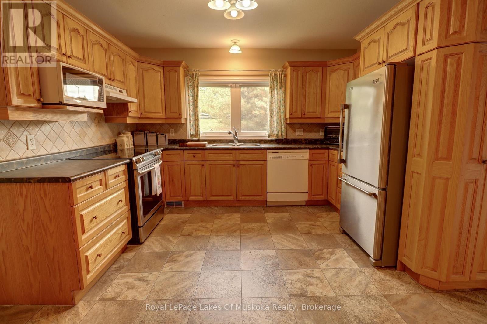 106 - 31 Dairy Lane, Huntsville, Ontario  P1H 2L7 - Photo 12 - X12425397