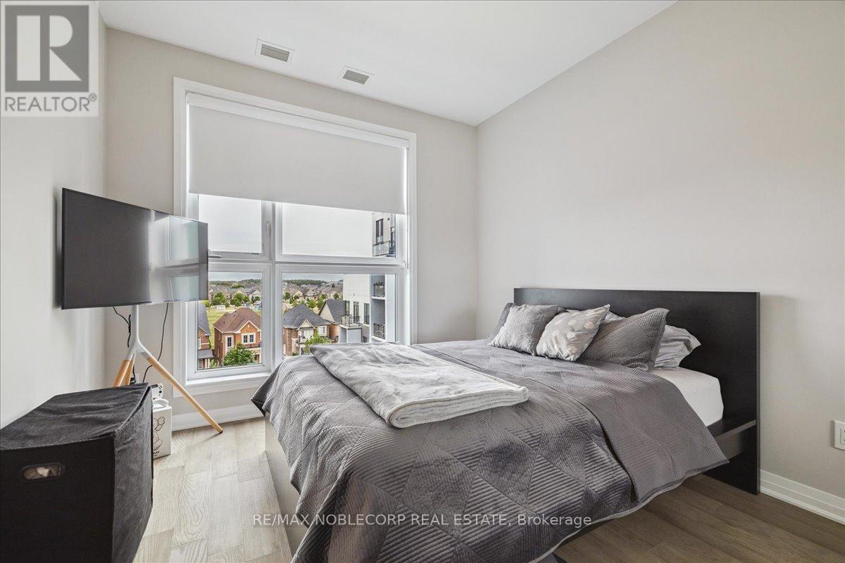 516 - 50 Kaitting Trail, Oakville, Ontario  L6M 4L9 - Photo 25 - W12427145