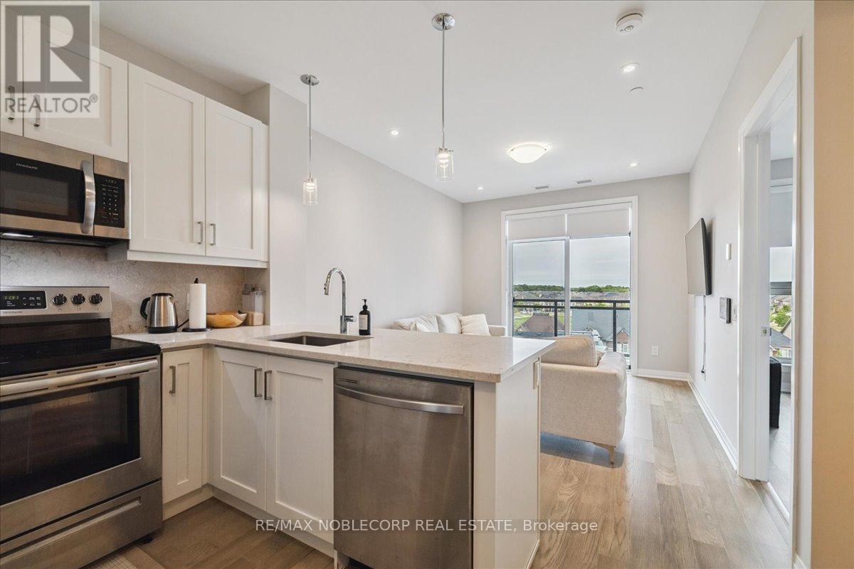516 - 50 Kaitting Trail, Oakville, Ontario  L6M 4L9 - Photo 8 - W12427145