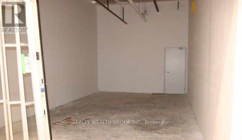 242 - 7777 Weston Road, Vaughan (Vaughan Corporate Centre), Ontario  L4L 0G9 - Photo 2 - N12427166