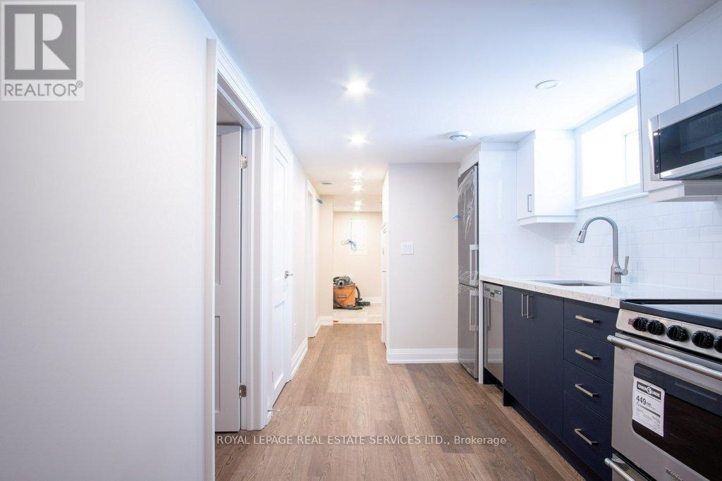 Lower - 256 Annette Street, Toronto, Ontario  M6P 1R1 - Photo 4 - W12426745