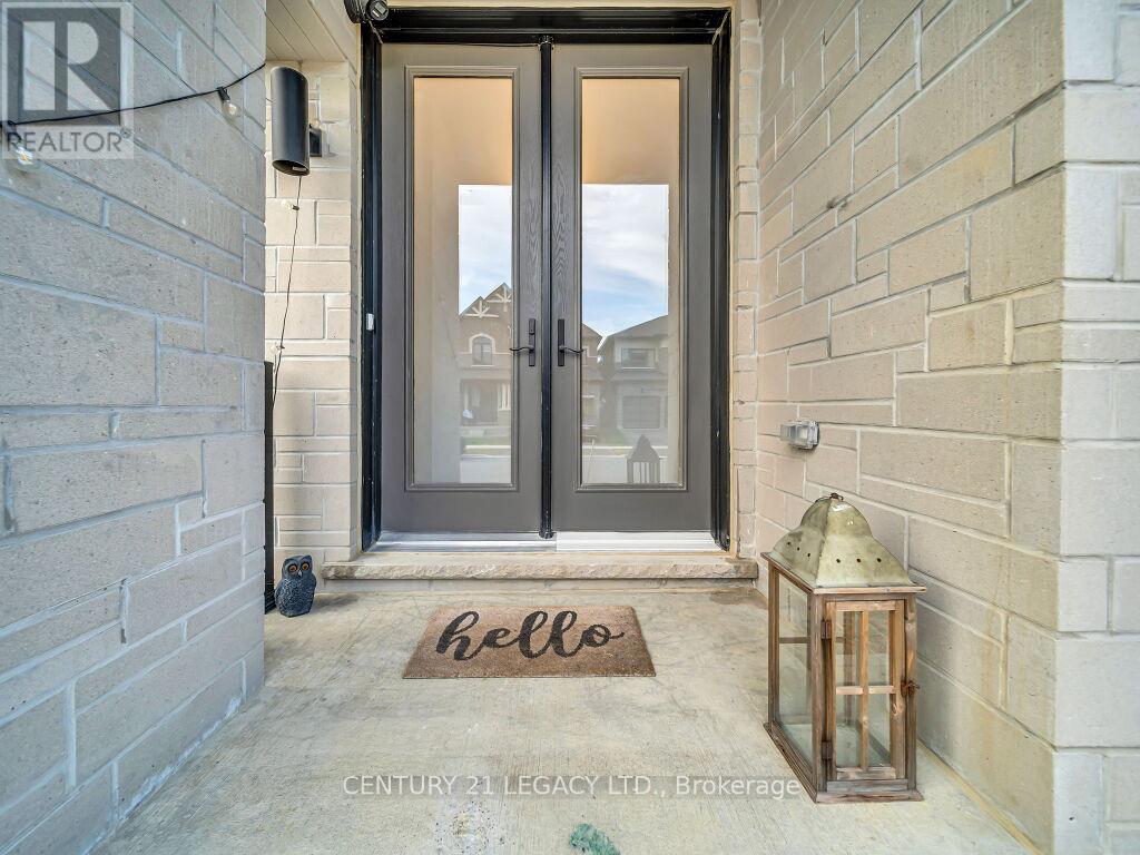 23 Duxbury Road N, Brampton, Ontario  L6R 4E3 - Photo 4 - W12427519