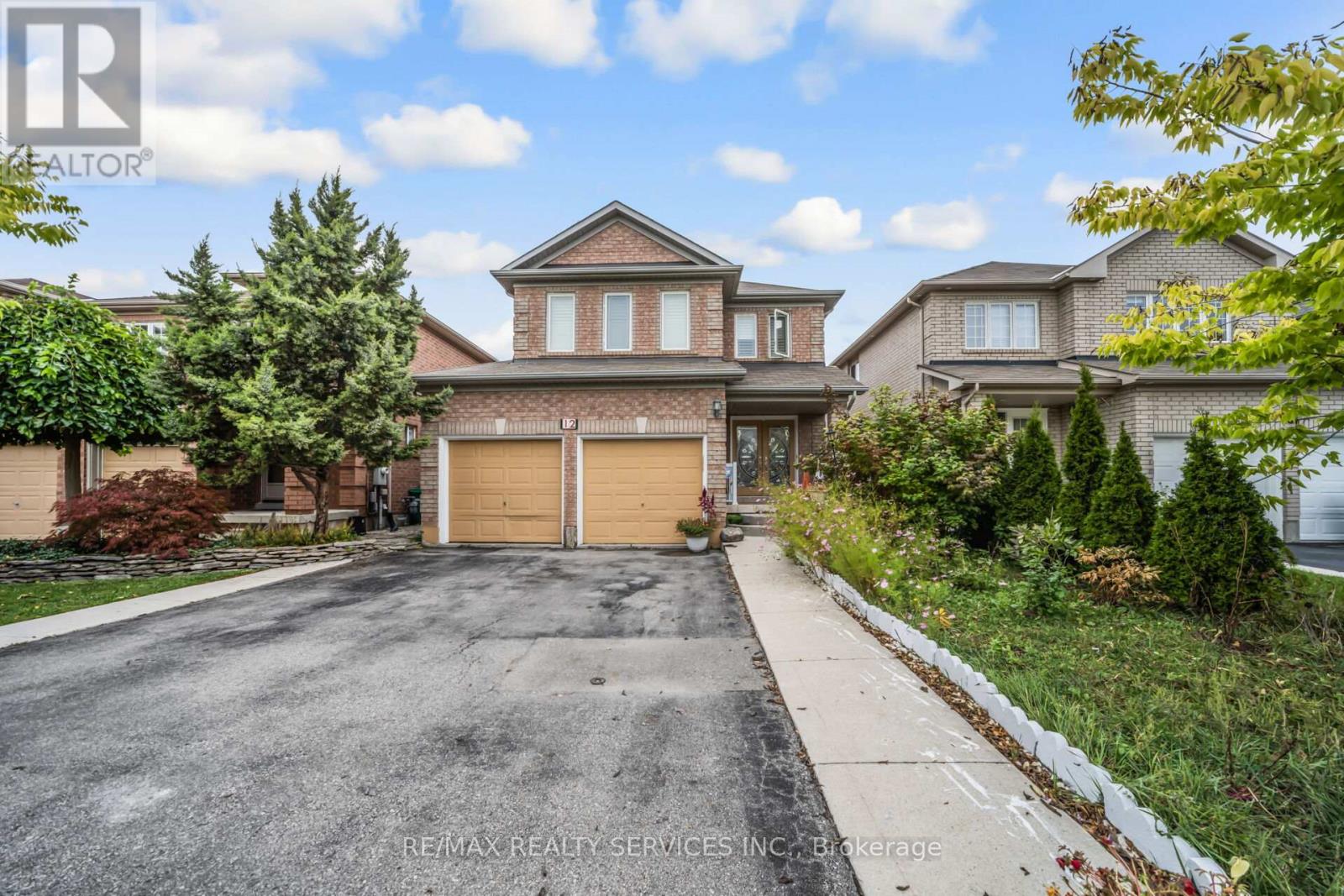 12 Roadmaster Lane, Brampton, Ontario  L7A 3A9 - Photo 2 - W12427532
