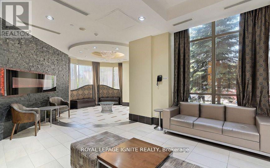 308 - 310 Burnhamthorpe Road W, Mississauga, Ontario  L5B 4P9 - Photo 2 - W12427558