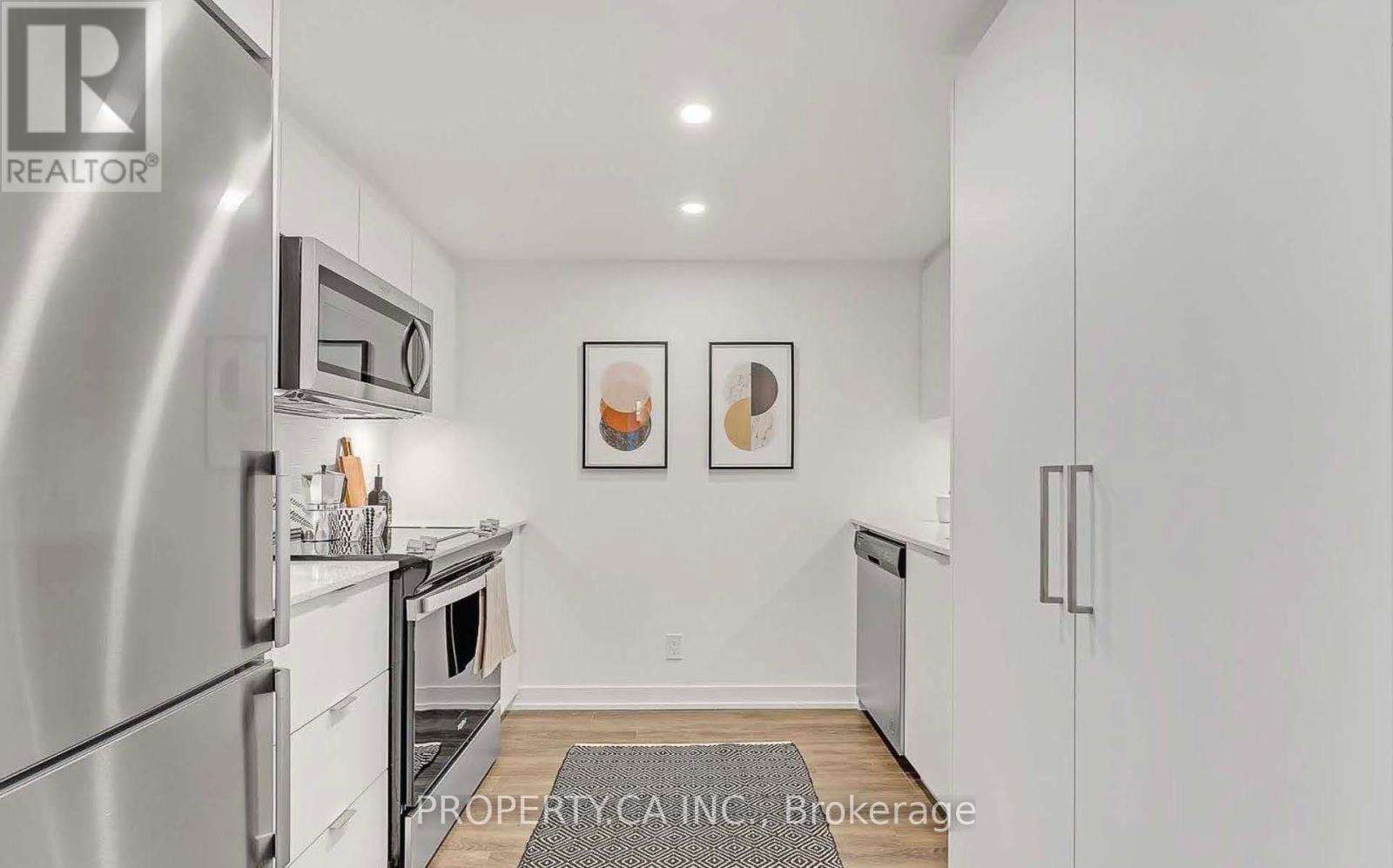 1308 - 30 Tretti Way, Toronto, Ontario  M3H 0E3 - Photo 4 - C12426145