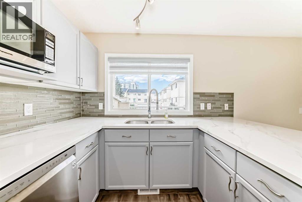 7 Millrose Place Sw, Calgary, Alberta  T2Y 3J6 - Photo 7 - A2243369