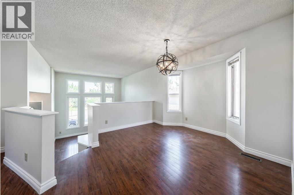 680 Macewan Drive Nw, Calgary, Alberta  T3K 3J5 - Photo 25 - A2256226