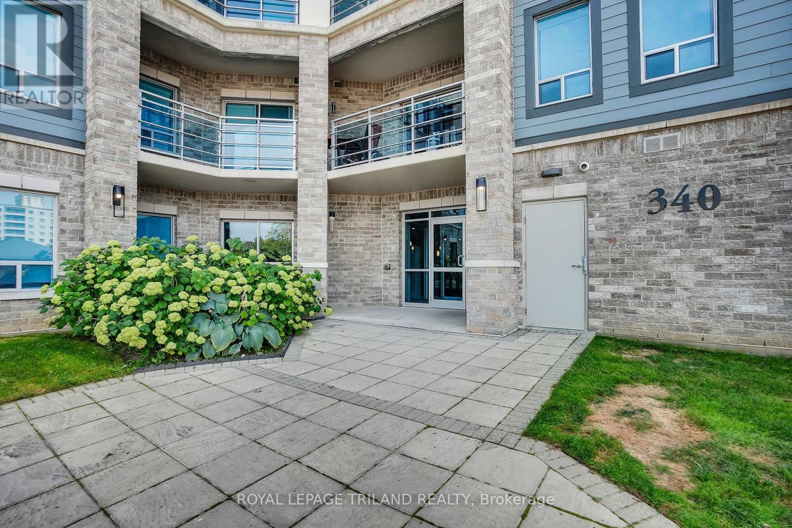 401 - 340 Sugarcreek Trail, London North, Ontario  N6H 0G4 - Photo 3 - X12398770