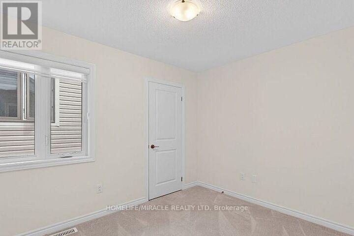 11 Phoenix Boulevard, Barrie, Ontario  L9S 2Z4 - Photo 25 - S12427744