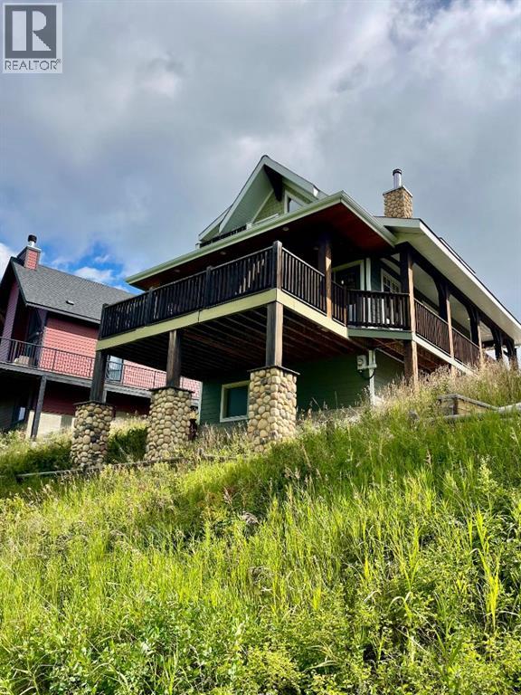 249 Cottageclub Crescent, Rural Rocky View County, Alberta  T4C 1B1 - Photo 32 - A2247550