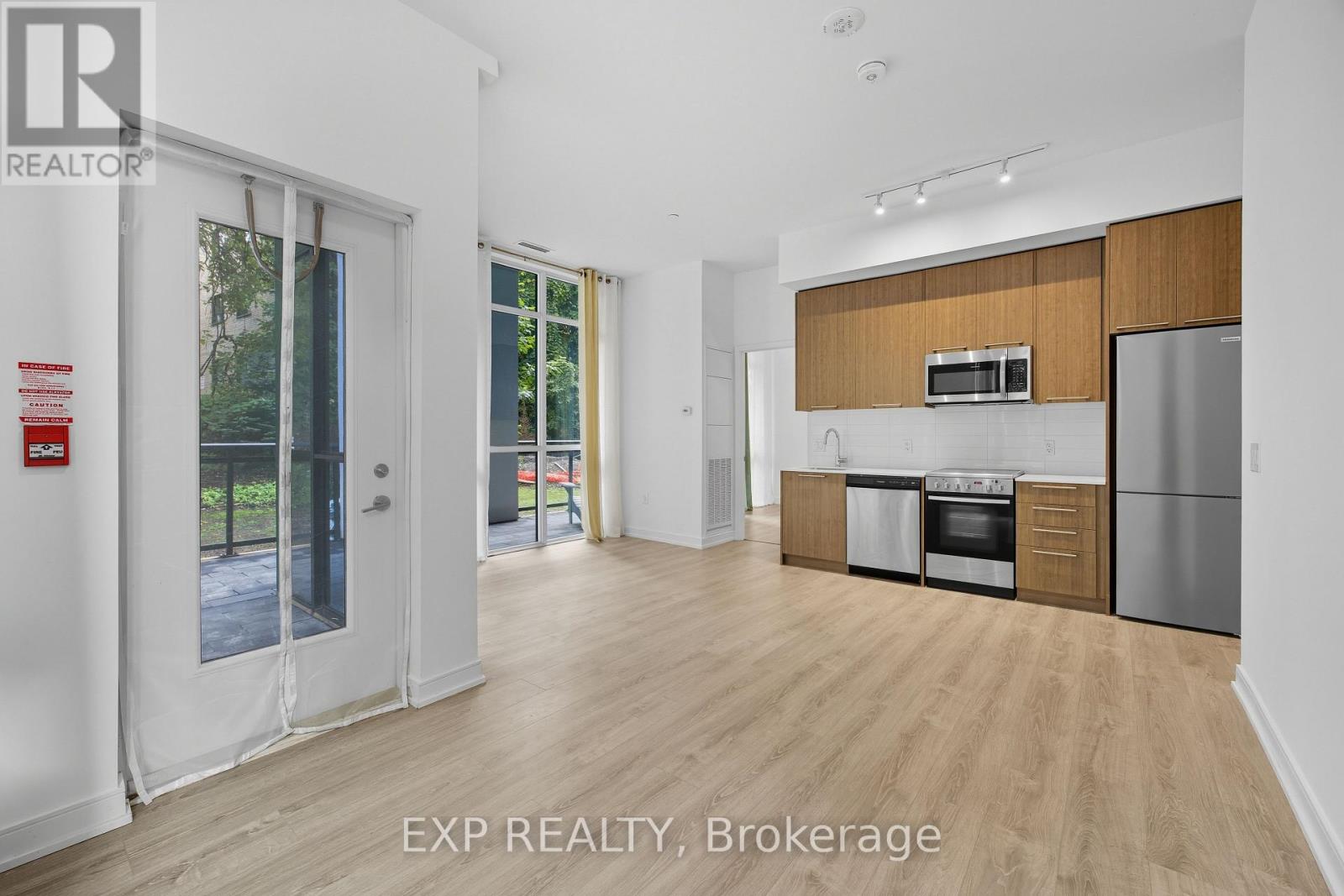 107 - 25 Neighbourhood Lane, Toronto, Ontario  M9Y 0C4 - Photo 7 - W12427774