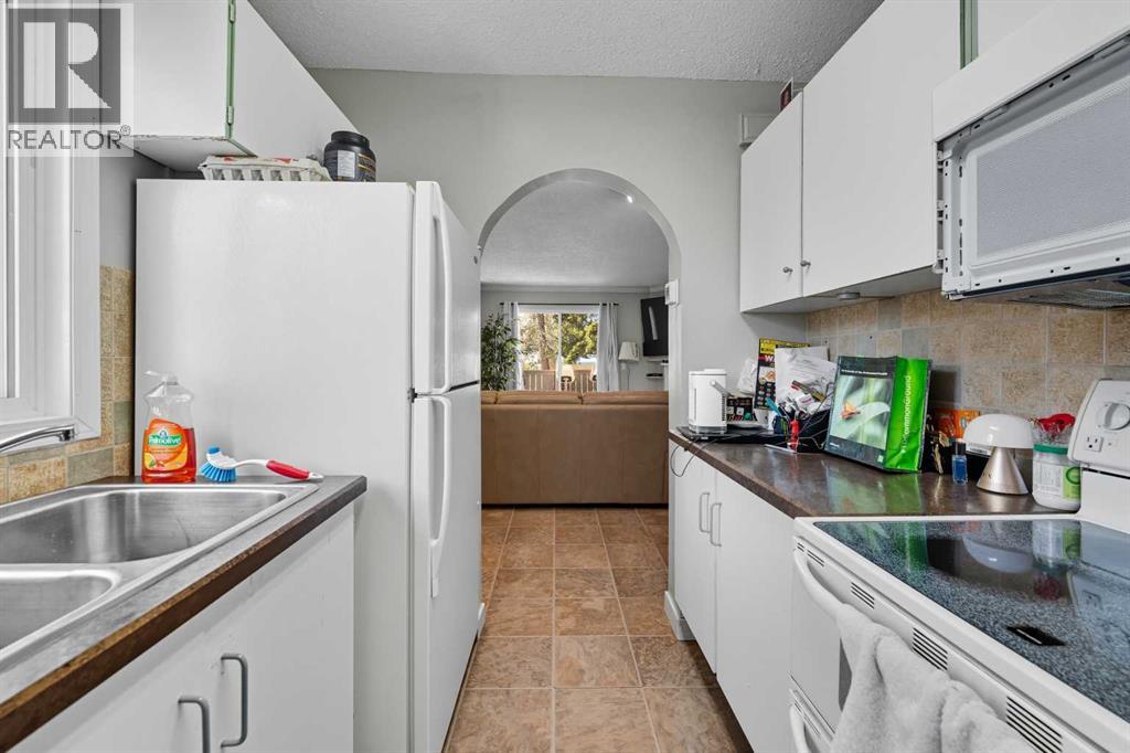 201, 829 Coach Bluff Crescent Sw, Calgary, Alberta  T3H 1B1 - Photo 6 - A2260118
