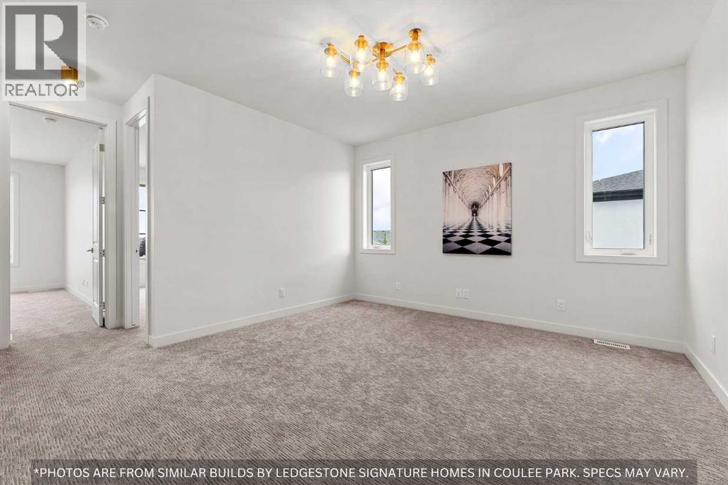 91 Coulee Crescent Sw, Calgary, Alberta  T3H 6B9 - Photo 30 - A2258648