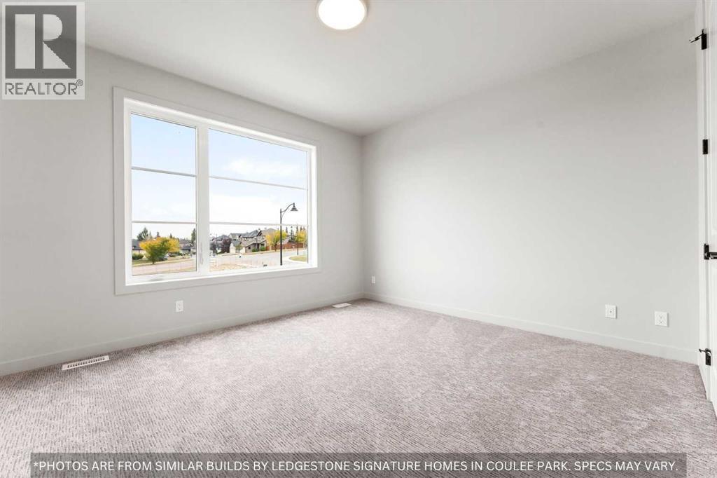 91 Coulee Crescent Sw, Calgary, Alberta  T3H 6B9 - Photo 33 - A2258648