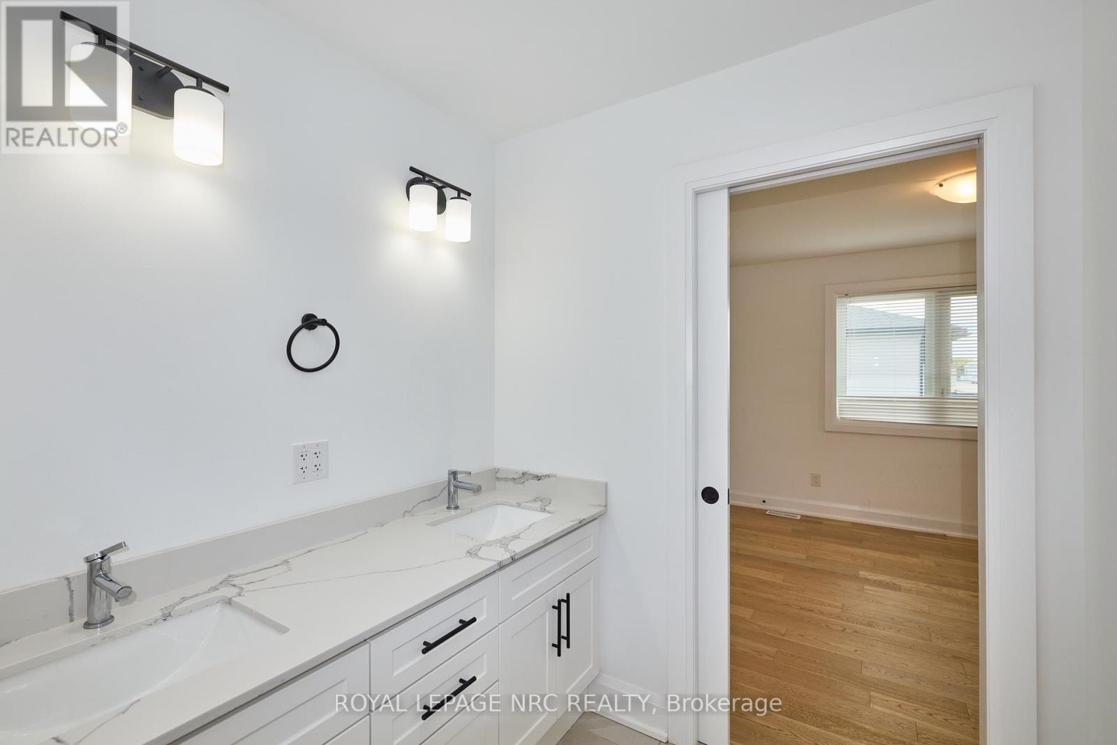 159 Hodgkins Avenue, Thorold, Ontario  L2V 0M6 - Photo 25 - X12428307