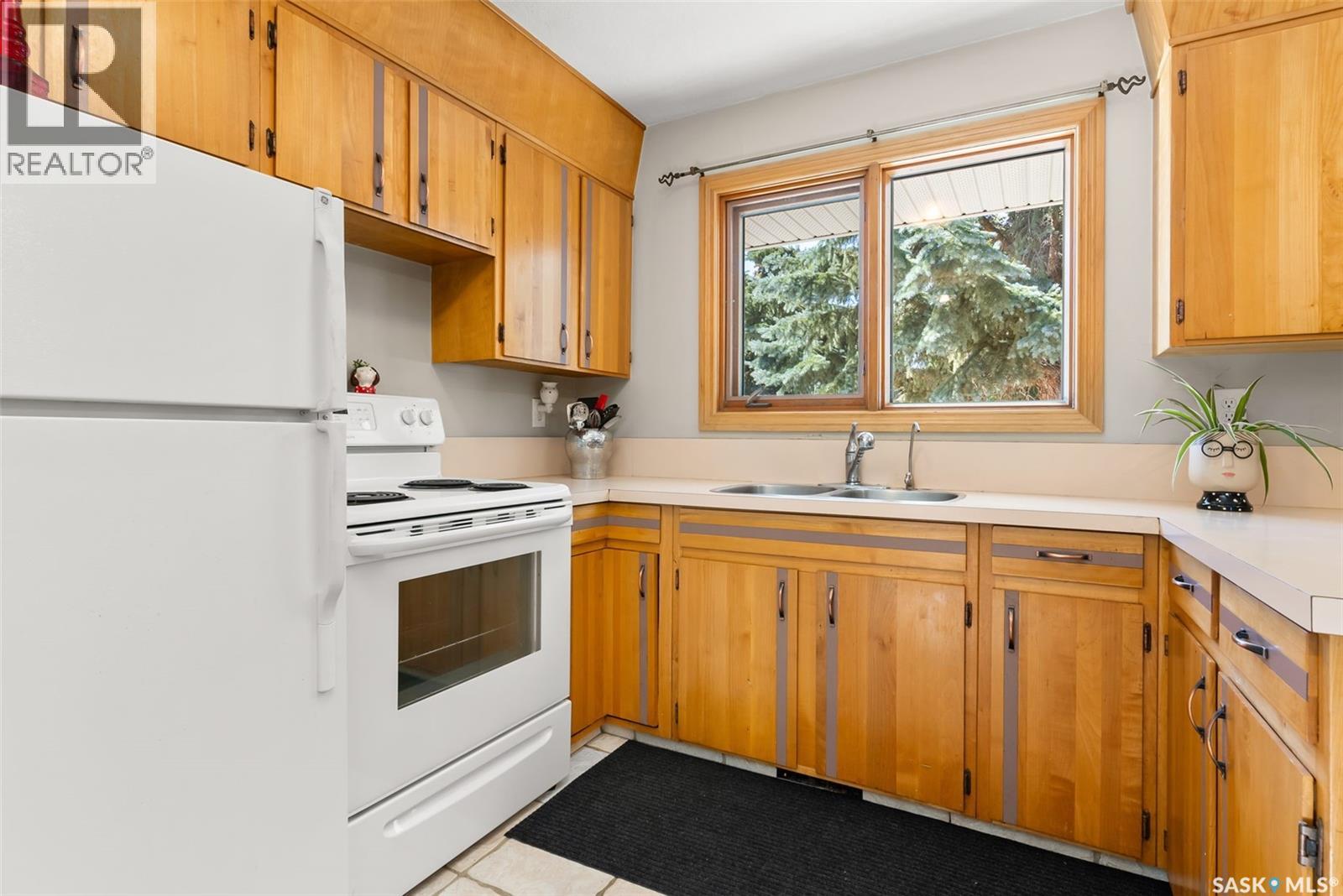 49 Mccormick Crescent, Regina, Saskatchewan  S4T 6J9 - Photo 7 - SK019355