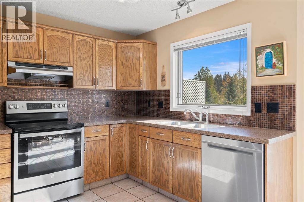 112 Riverview Circle, Cochrane, Alberta  T4C 1K5 - Photo 18 - A2258426