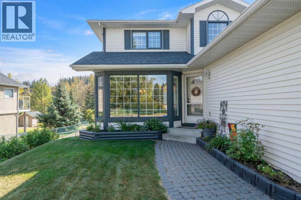 112 Riverview Circle, Cochrane, Alberta  T4C 1K5 - Photo 4 - A2258426