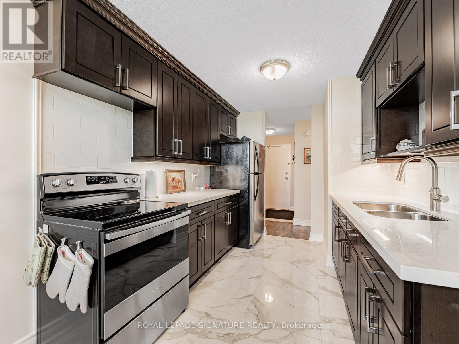 2003 - 100 Wingarden Court, Toronto, Ontario  M1B 2P4 - Photo 15 - E12428280