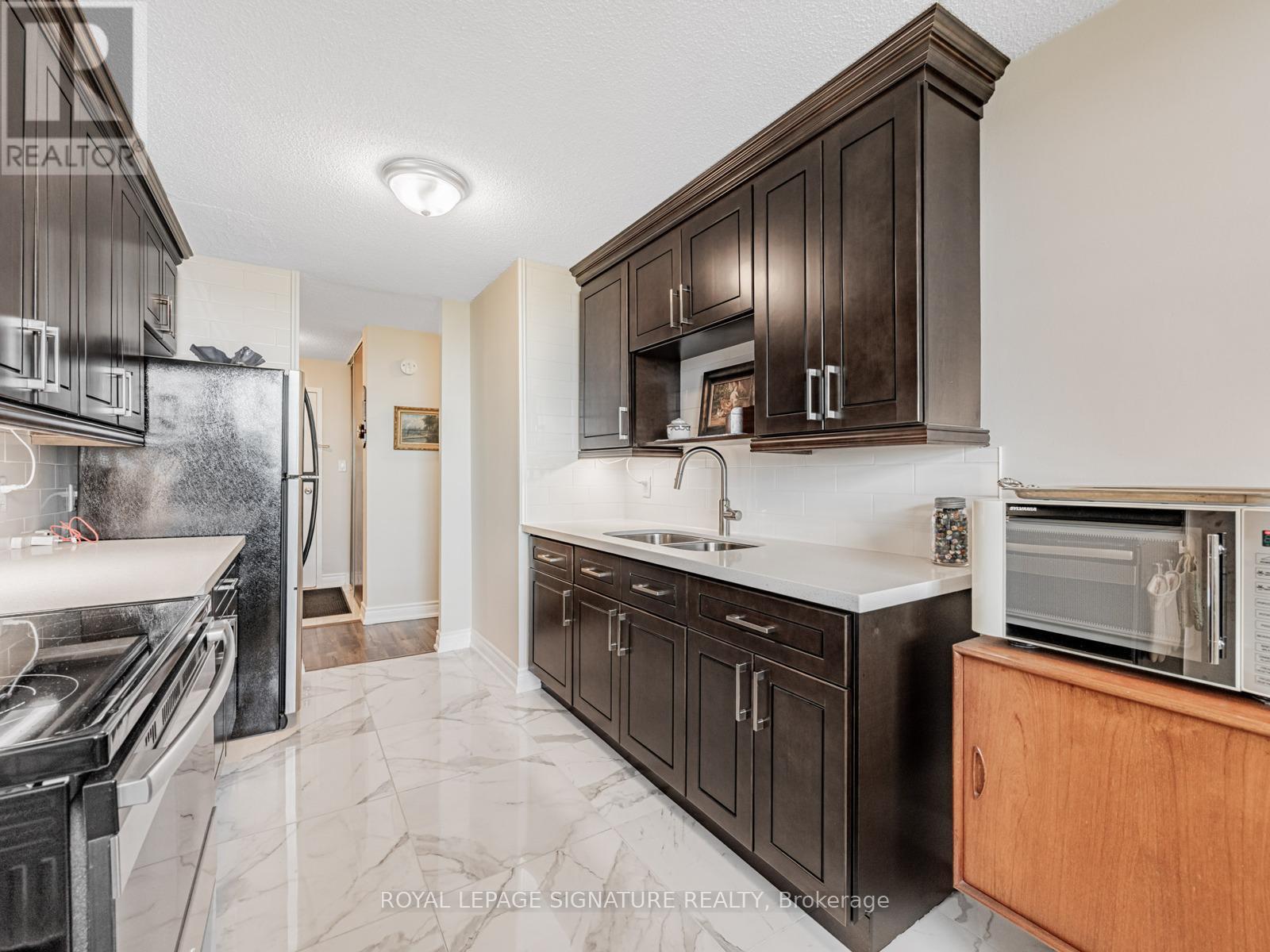 2003 - 100 Wingarden Court, Toronto, Ontario  M1B 2P4 - Photo 16 - E12428280