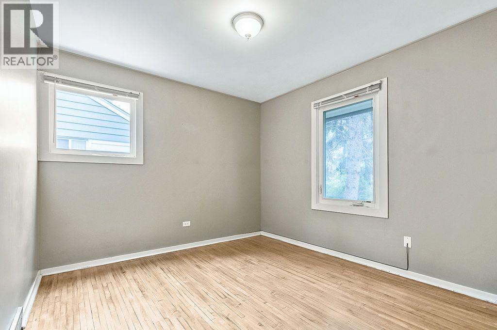 906 Rundle Crescent Ne, Calgary, Alberta  T2M 3B9 - Photo 14 - A2254834