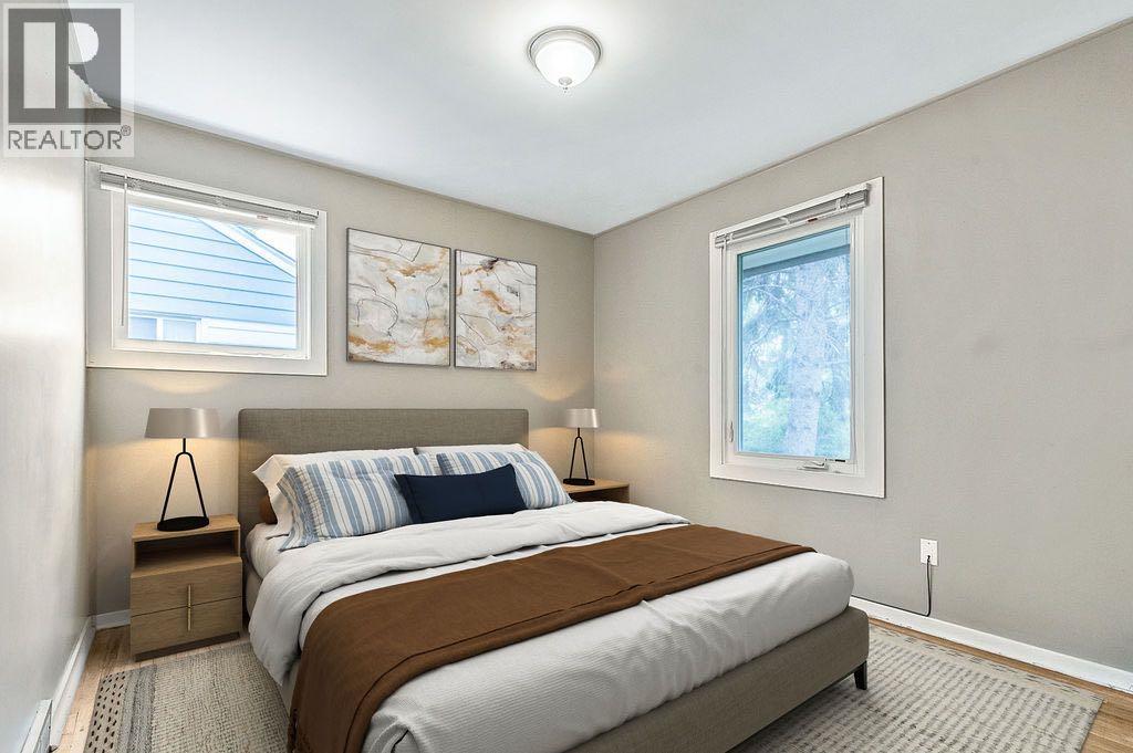906 Rundle Crescent Ne, Calgary, Alberta  T2M 3B9 - Photo 4 - A2254834
