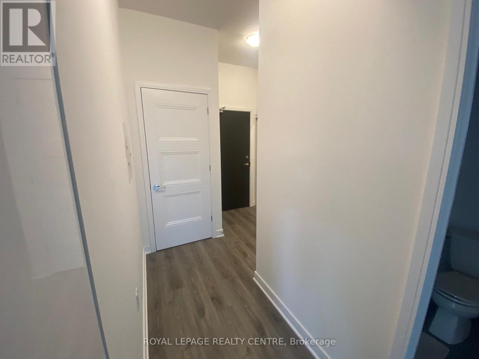 709 - 25 Neighbourhood Lane, Toronto, Ontario  M9Y 0C4 - Photo 3 - W12428194