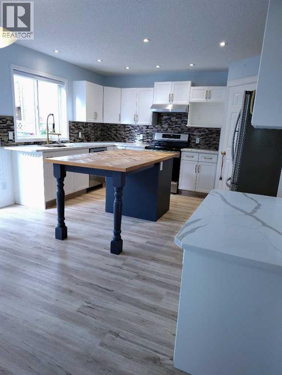11 Tuscany Valley Road Nw, Calgary, Alberta  T3l 2C1 - Photo 8 - A2257126