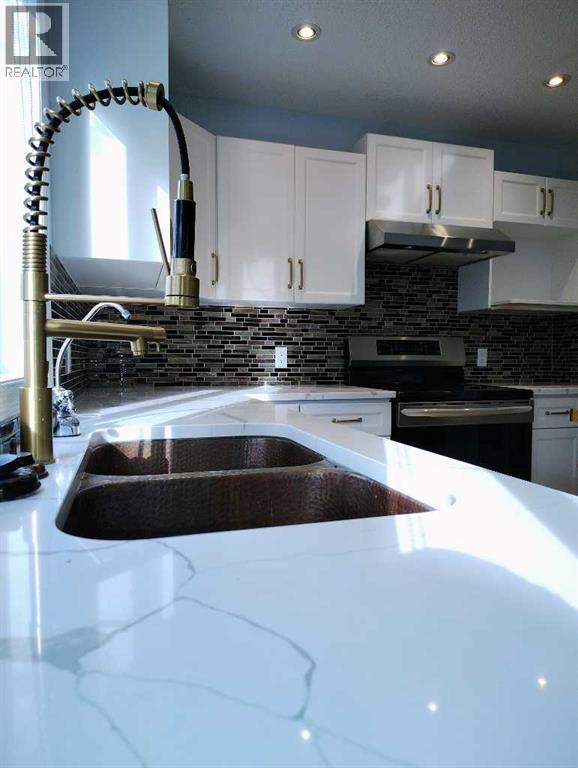 11 Tuscany Valley Road Nw, Calgary, Alberta  T3l 2C1 - Photo 25 - A2257126