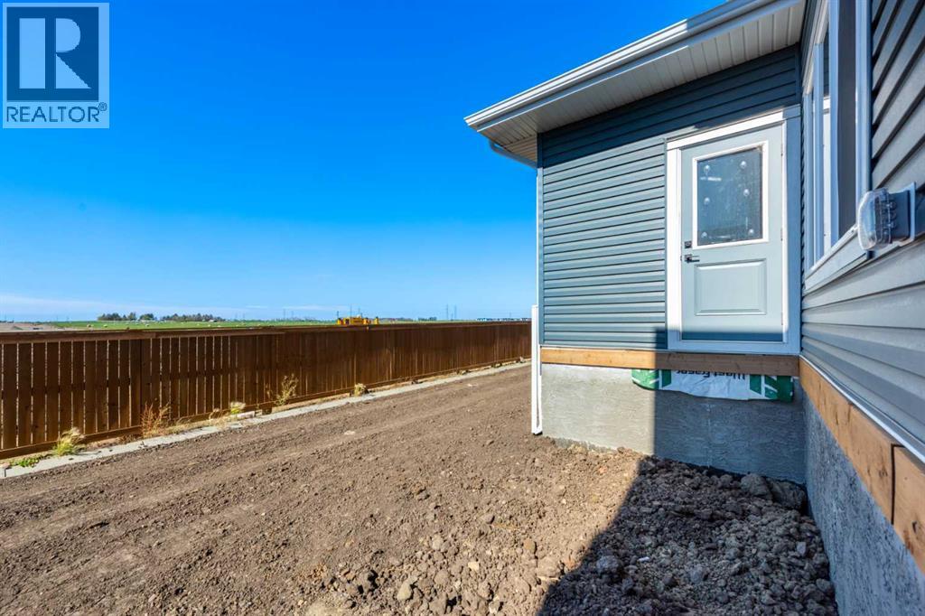 55 Waterford Street, Chestermere, Alberta  T1X 2Z6 - Photo 5 - A2260095