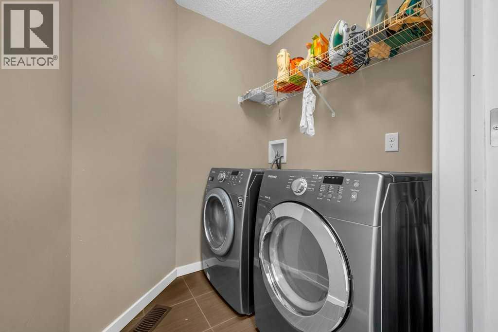 1186 Kings Heights Way Se, Airdrie, Alberta  T4A 0S4 - Photo 28 - A2253628