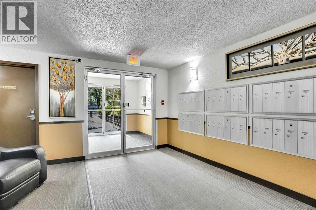 203, 21 Dover Point Se, Calgary, Alberta  T2B 3K4 - Photo 3 - A2258911