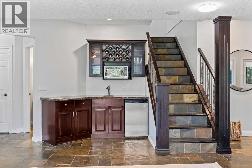 230 Bow Ridge Court, Cochrane, Alberta  T4C 1T5 - Photo 34 - A2234195
