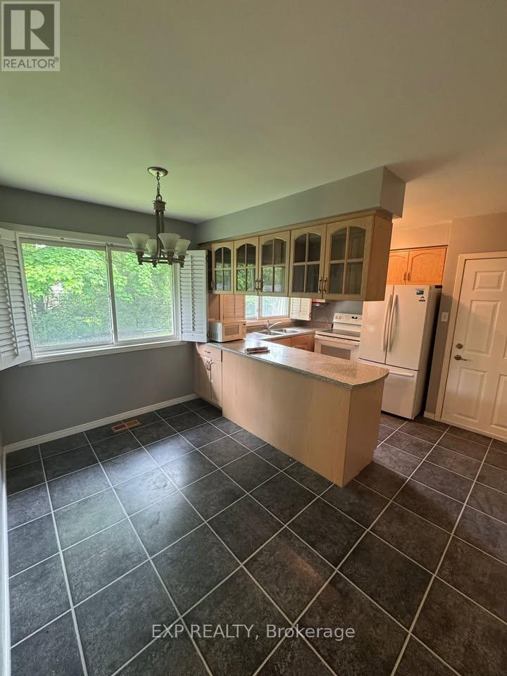 370 Greenbrook Drive, Kitchener, Ontario  N2M 4K4 - Photo 4 - X12428778