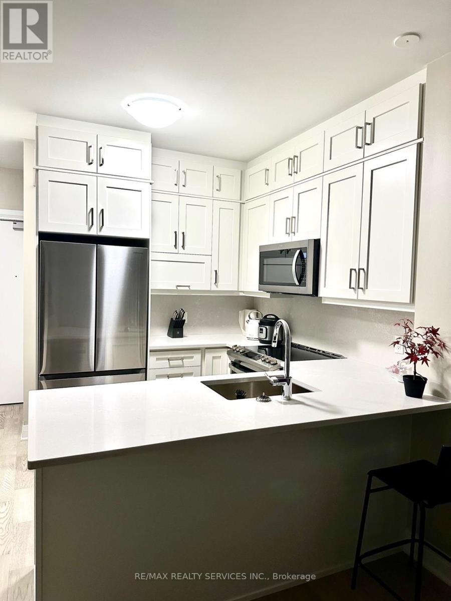 403 - 50 Kaitting Trail W, Oakville, Ontario  L6M 5N3 - Photo 5 - W12347534