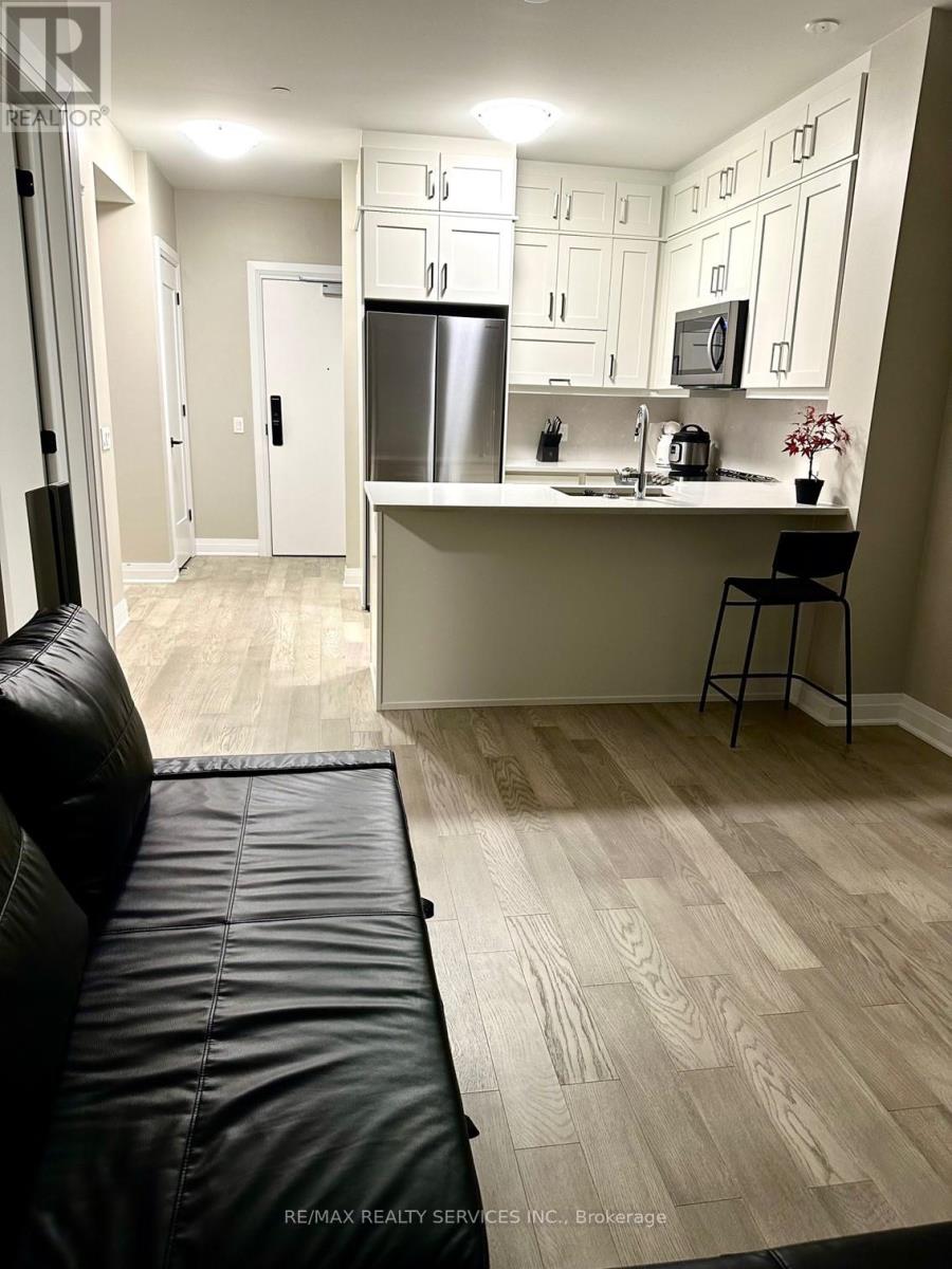 403 - 50 Kaitting Trail W, Oakville, Ontario  L6M 5N3 - Photo 6 - W12347534
