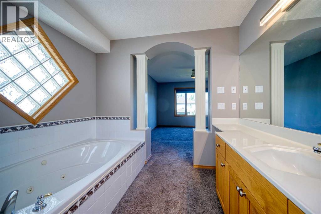 19 Westpoint Court Sw, Calgary, Alberta  T3H 4M7 - Photo 25 - A2259231