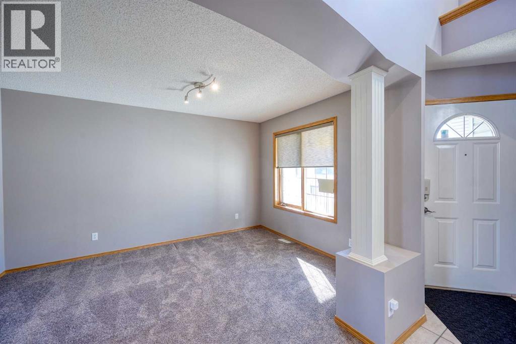 19 Westpoint Court Sw, Calgary, Alberta  T3H 4M7 - Photo 7 - A2259231